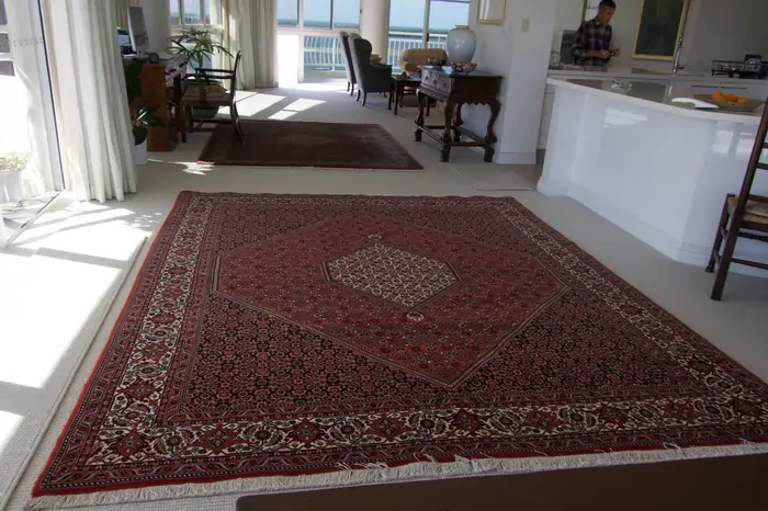 Authentic Persian Bijar rug featured inside Cliff’s home